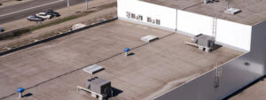 commercial building rooftop with AC units in Tucson, AZ by DC Roofing
